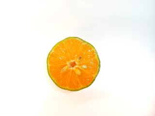 Lemon isolated. Round slice of ripe lemon on a white background. Fresh fruits with copy space