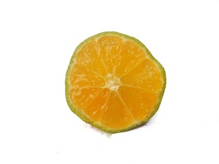 Lemon isolated. Round slice of ripe lemon on a white background. Fresh fruits with copy space