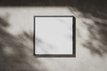 White blank square poster in a metal frame on a plaster wall