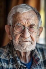 Portrait of an Elderly Man with Glasses in Plaid Shirt