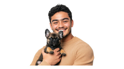 Obraz premium A young man smiles while holding a small dog in a cozy living space during the daytime.