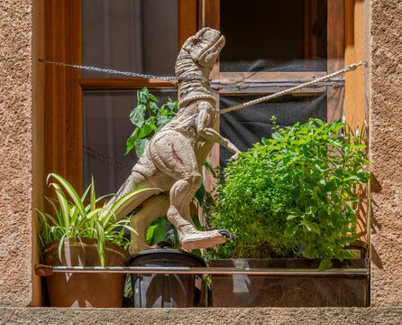 Chained dinosaur figure