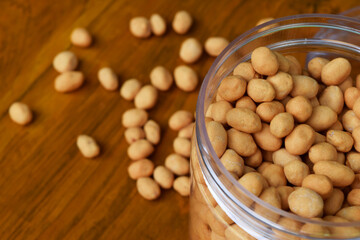 Closeup photo of Dried atomic beans in food storage or jar on wooden table