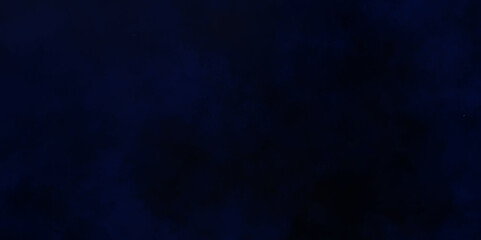 Abstract dark blue watercolor cloudiness, mist, or smog background. Dark navy blue sky with black background and blurred pattern. Vivid textured aquarelle painted art design background.
