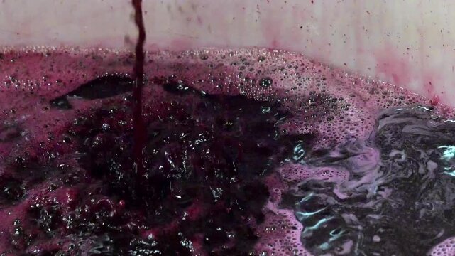 Wine factory, Aeration of grape juice during wine making in a cellar, Bordeaux Vineyard, France. High quality 4k footage