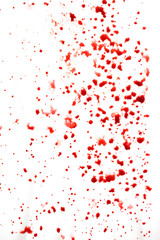 A red splatter of blood on a white background