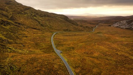 Glenveagh National Park in Donegal Ireland aerial view - The breathtaking landscape features rolling hills that gracefully descend into lush green valleys