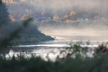 Golden sunset mist over Daugava river near Kraslava, Latvia