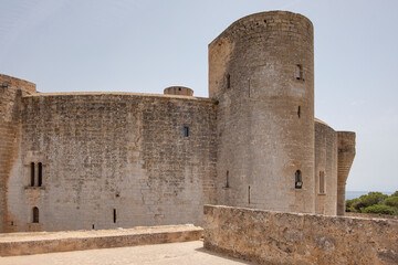 The medieval Bellver Castle, 14th-century Gothic-style fortress with round towers, narrow windows...