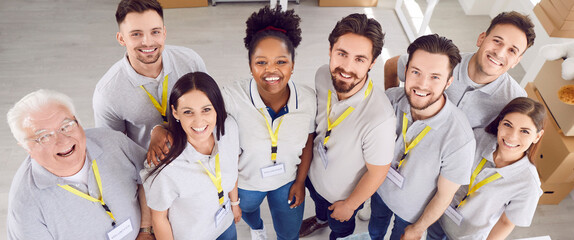 Multicultural group of happy volunteers of different ages, close-up. Portrait of charity foundation employees. Concept contented emotion, employees together, volunteer opportunities