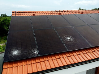Three big dents from hail on a new solar power plant