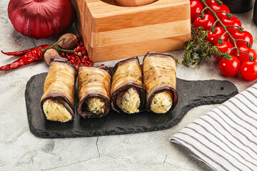 Baked eggplant roll with cheese
