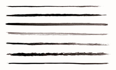 Obraz premium set of watercolor black grunge brushes, lines highlight and emphasize inside text