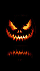 Fototapeta premium Halloween pumpkin with fangs on black background