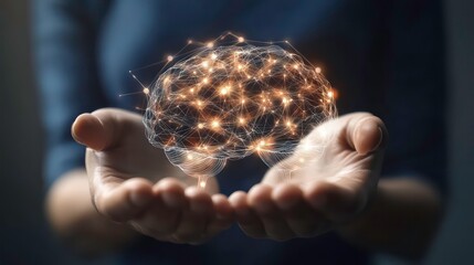 A person's hands are cupped together and holding a glowing digital representation of the human brain, suggesting intelligence, knowledge, and understanding.
