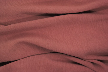 Abstract texture a wrinkled peach blanket