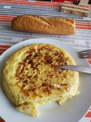Spanish potato tortilla with onion served with bread