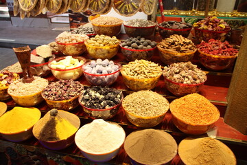 Spices for sale in a market in Dubai's Old Town, Dubai, UAE.
