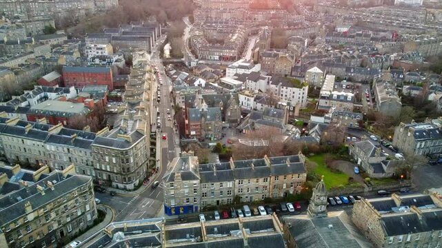 Slow motion footage of Edinburgh&rsquo;s Stockbridge neighborhood, showcasing classic stone buildings, narrow streets, and a blend of residential and commercial architecture.