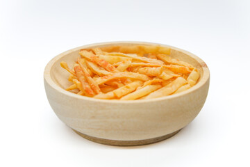 Pile of wonton chips in a wooden bowl
