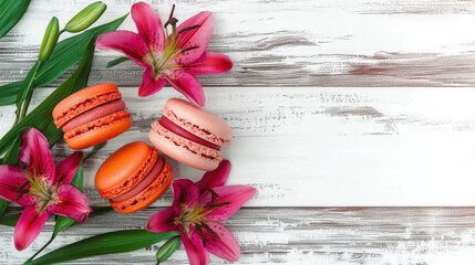 Delicate macarons and lilies on a wooden surface