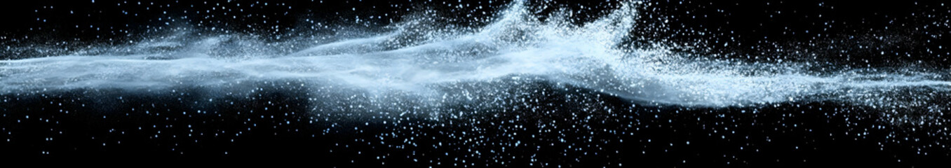 A dynamic spray of water particles against a dark background, creating a sense of movement. Black and white background images -