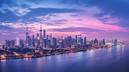 Fototapeta premium An expansive view of a Chinese city skyline during the blue hour, just after sunset. The city is beginning to glow with artificial lights, and the sky is a deep blue with traces of pink and purple.