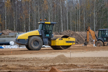 Soil Compactor for leveling ground for foundation and on road construction. Road compaction...