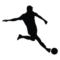 Silhouette of a soccer player kicking the ball