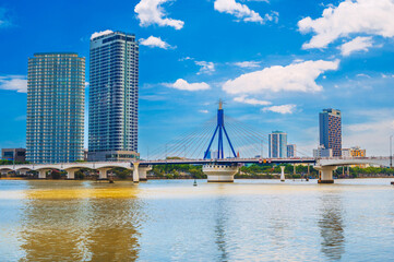 Han River Bridge over the Han River and skyscrapers in Da Nang in Vietnam on a summer day