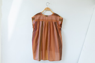 Summer clothes  on a hanger.