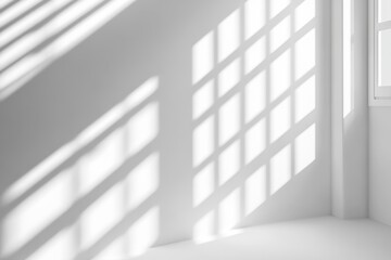 Abstract sunlight pattern on a white wall.