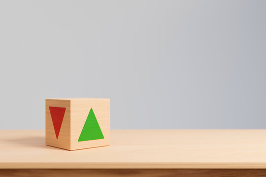 Flipping of wooden blocks with arrow up and down. Business planning for target achievement. Measure of performance for a specific objective. 3d render