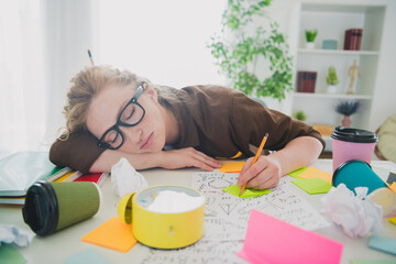 Photo of sleepy girl wear shirt sit table remote education wok hard from home indoors workplace...