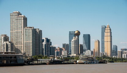 Naklejka premium Modern skyscrapes along the Yangtze River in Wuhan, China