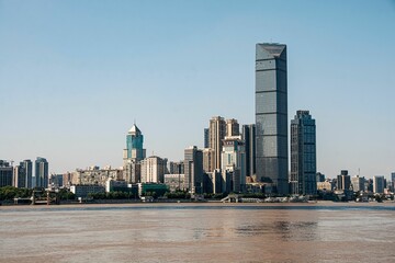Obraz premium Modern skyscrapes along the Yangtze River in Wuhan, China