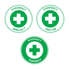 Green pharmacy labels with the draw of a cross on a white background
