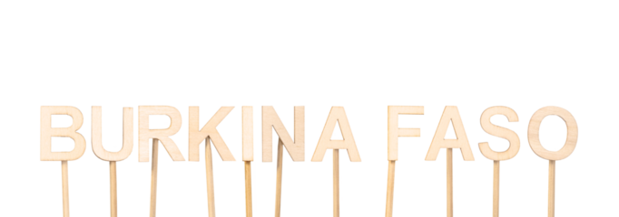 Wooden letters forming the name Burkina Faso held by small support sticks.