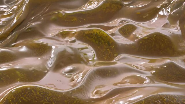 abstract fascinating animation filthy slime flesh background seamless looping 4K that highlights oily bowel patterns creating captivating visual effect blob worm pattern texture