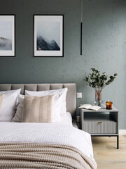 Bedroom interior with minimalistic furniture and home decor