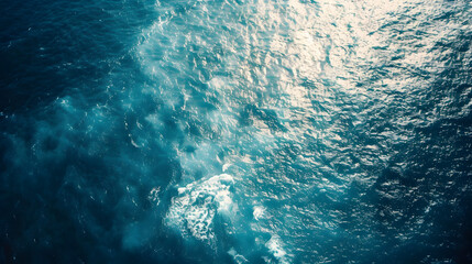 Obraz premium Breathtaking Aerial View of the Majestic Blue Ocean with Captivating Waves and Rippling Textures