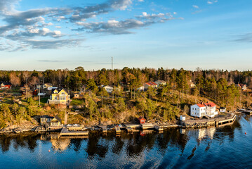 View of the islands in the archipelago of Stockholm at a beautiful sunny day sunset. Sweden. Water...
