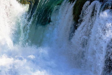 Water flowing from a waterfall