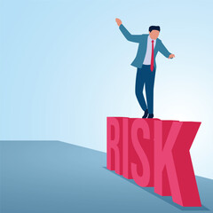 Fototapeta premium A man walks slowly and carefully on a big risk sign. Illustration of risk management, business mistakes, strategy and planning.