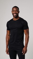 African American model showcases clean logo-friendly black tee against neutral backdrop