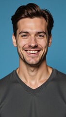 Obraz premium Elegant African American male model with brown hair against blurred deep sky blue background