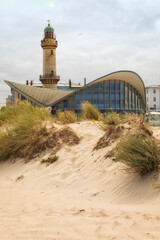 Dunes and lighthouse at Rostock-Warnemünde, Germany