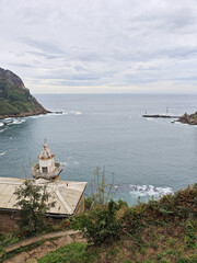 Fototapeta premium The lighthouse de Senokozulua, Pasaia village, the Basque Country, Spain