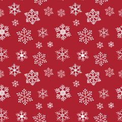 Winter seamless pattern with white snowflakes on red background. Vector illustration for fabric, textile wallpaper, posters, gift wrapping paper. Christmas vector illustration