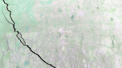Fototapeta premium Cracked walls and faded paint